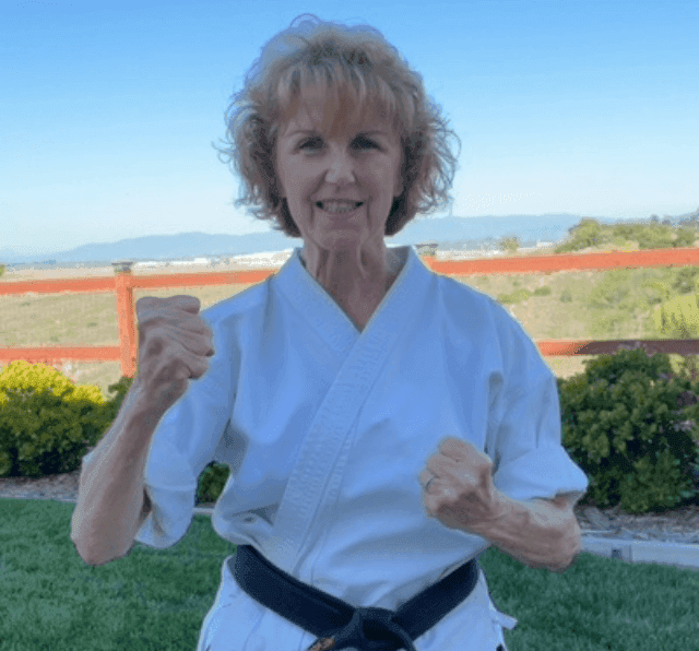 Cindy Baez demonstrating self-defense as a black belt martial artist